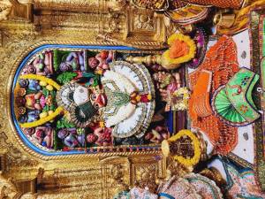 Close-up of a beautifully decorated Hanuman idol in a temple