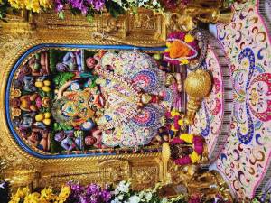 Close-up of a beautifully decorated Hanuman idol in a temple
