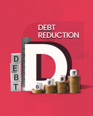 Image depicting debt reduction with blocks spelling 'DEBT' and coins.