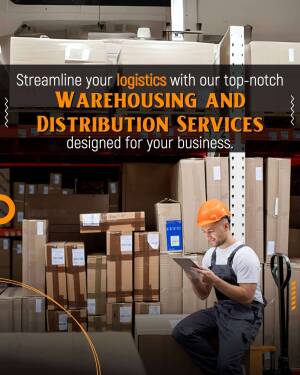 Worker using a tablet in a warehouse with stacked boxes