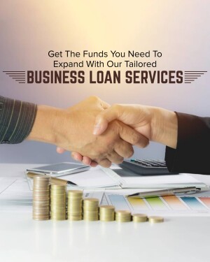 Handshake over a desk with money and financial tools, representing business loan services.