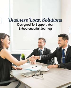 Business professionals shaking hands during a loan consultation