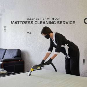 Woman cleaning a mattress with professional equipment