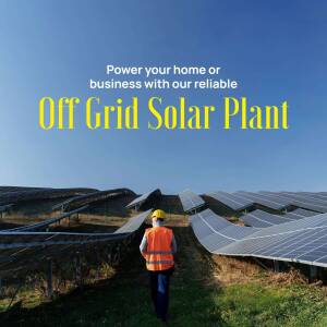 Worker inspecting a large solar panel farm with a blue sky background.