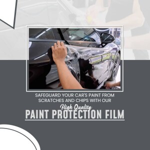 Professional application of paint protection film on a car door.