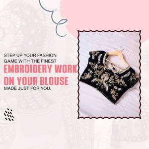 Black embroidered blouse on a hanger with a pink and white background