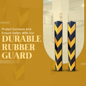 Yellow and black rubber guard protectors in a parking garage