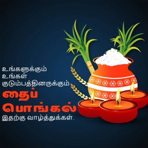Pongal pot with sugarcane and lit lamps