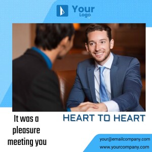 Two men in suits having a friendly conversation during a meeting.