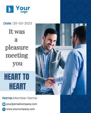 Two business professionals shaking hands during a meeting.