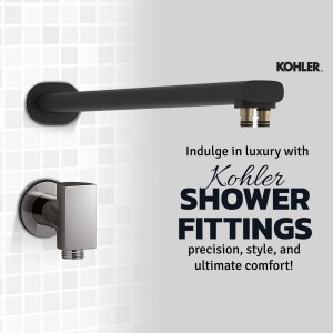 Close-up of a sleek black and silver Kohler shower fitting mounted on a tiled wall.