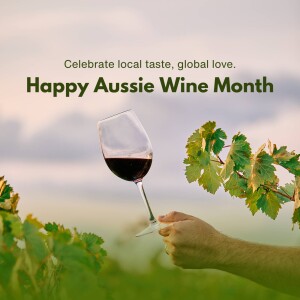 A glass of red wine held against a vineyard background with text celebrating Aussie Wine Month.