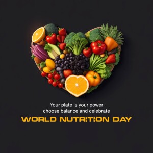 A heart-shaped arrangement of colorful fruits and vegetables with the text 'World Nutrition Day'