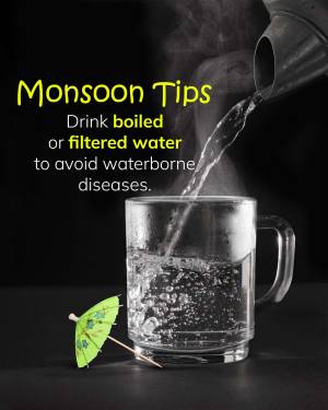 A glass of water being filled from a funnel with a miniature umbrella, illustrating monsoon health advice.