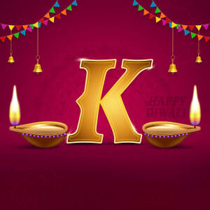 Golden letter K with Diwali decorations