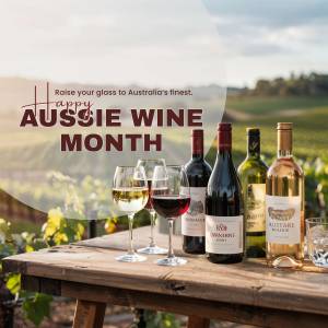 Selection of Australian wines on a wooden table with vineyard background