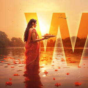 A woman in traditional attire offering prayers during Chhath Puja at sunrise.