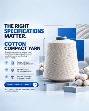 A large spool of high-quality cotton compact yarn displayed with cotton flowers on blue geometric blocks.