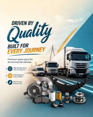 Commercial vehicle spare parts displayed on a road with trucks in the background