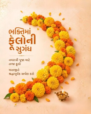 Crescent arrangement of yellow and orange marigold flowers with a lit diya for Navratri festival