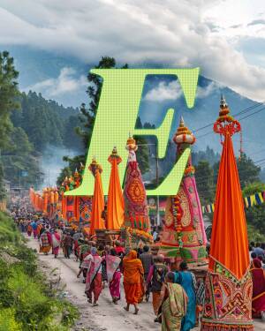 A vibrant scene of a Buddhist procession with colorful prayer flags and a large letter 'E' superimposed on the image.