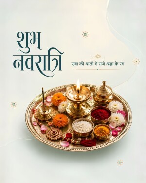 A traditional brass puja thali with lit diya, flowers, kumkum, and rice for Navratri festival