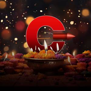 Letter G with Diwali decorations and lit candles