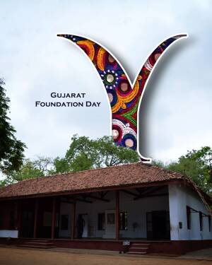 Colorful 'Y' letter with Gujarat Foundation Day text over a building