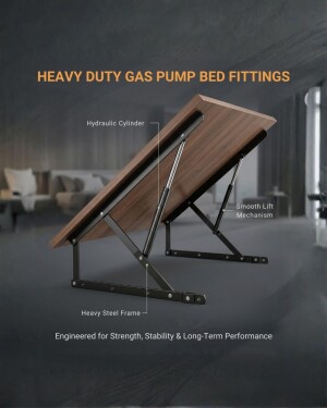 A close-up view of a hydraulic gas pump lift mechanism installed on a wooden bed frame.