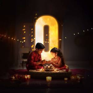 Two children celebrating Diwali with a lit diya and sweets.