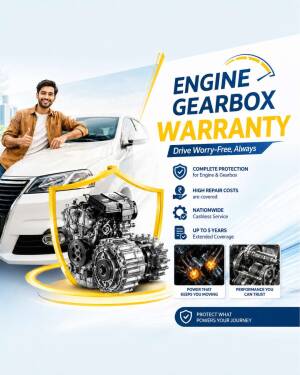 A smiling man leaning on a white car with an engine and gearbox warranty advertisement