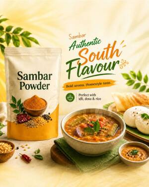 A packet of Sambar powder next to a bowl of hot sambar, idli, and spices, showcasing authentic South Indian flavors.