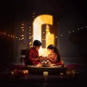 Two children celebrating Diwali with a lit diya and illuminated letter 'I'