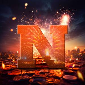 Letter N illuminated by fireworks and candles against a city skyline