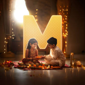 A brother and sister celebrating Raksha Bandhan with sweets and decorations.