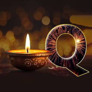 A diya lamp with a sparkling letter Q for Diwali