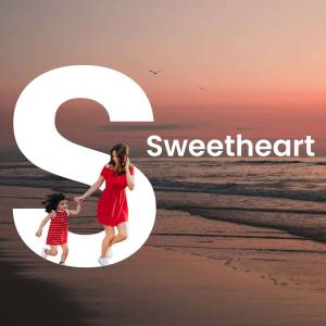 Mother and daughter holding hands running on a beach with a large letter 'S' overlay