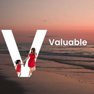 Mother and child silhouetted against a sunset beach with a large letter 'V'