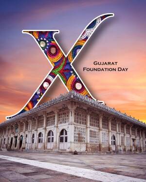 Decorative letter 'X' with Gujarat Foundation Day text over a historical building at sunset