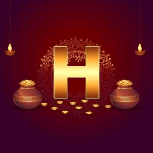 Golden letter H surrounded by traditional Diwali decorations like oil lamps and earthen pots.