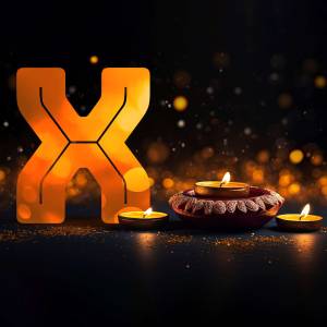 Illuminated letter X with Diwali candles and bokeh lights