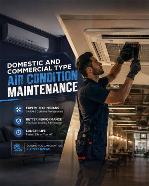 A technician wearing professional workwear performing maintenance on a ceiling-mounted commercial air conditioning unit.