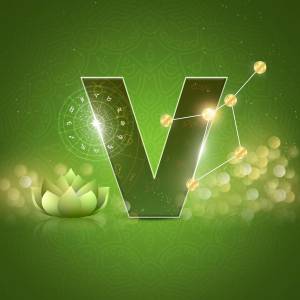 Letter V with astrological symbols and a green lotus flower