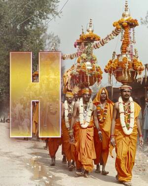 A procession of Hindu monks carrying ornate vessels and garlands, with a large letter 'H' in the foreground.