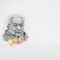 A grayscale portrait of Keshubhai Patel decorated with a vibrant bouquet of roses