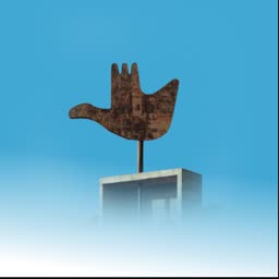The iconic metallic Open Hand monument sculpture set against a clear blue sky in Chandigarh
