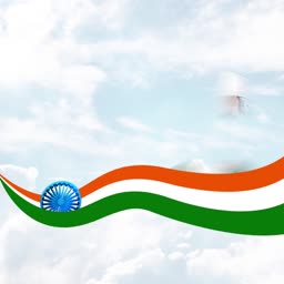 An artistic representation of the Indian flag with saffron, white, and green waves set against a soft cloudy sky background featuring the Ashoka Chakra.