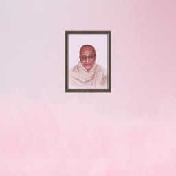 Framed portrait of a bald elderly Indian man wearing glasses and a shawl against a soft pink background