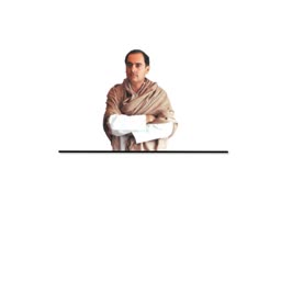Rahul Gandhi wearing a beige shawl and white kurta