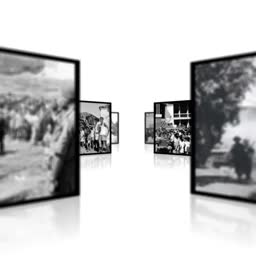A virtual gallery display featuring various black and white historical photographs arranged in perspective